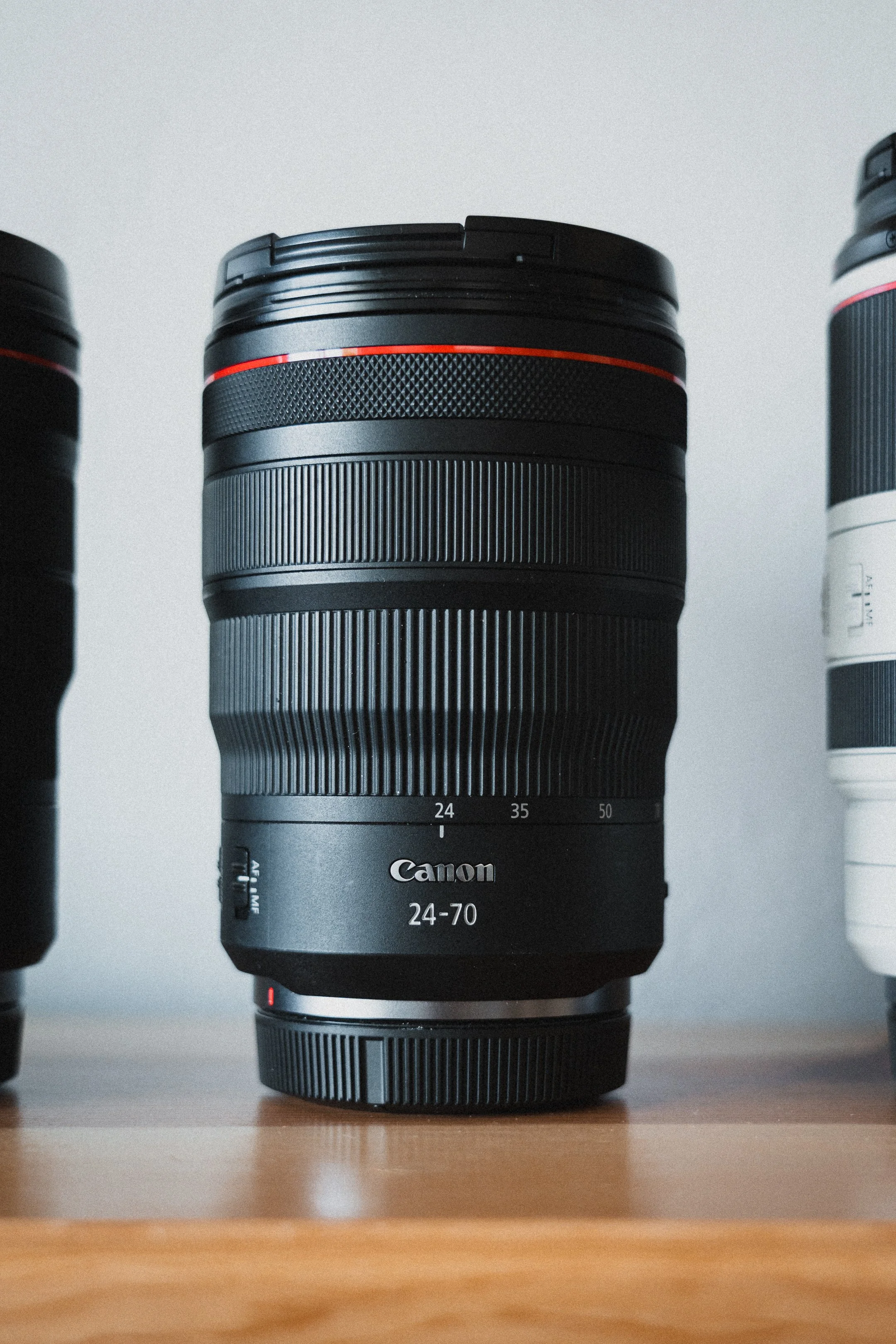 Canon RF 24-70mm f2.8 Lens - My daily driver that hardly leaves my main body camera. For portraits, street, telephoto, etc. A perfect all around lens for any kit
