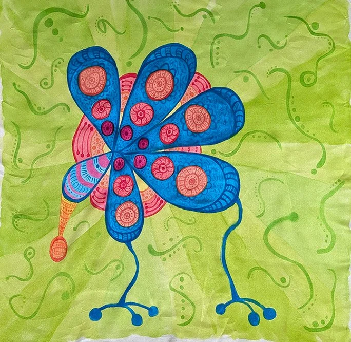 Blue design with legs on green background