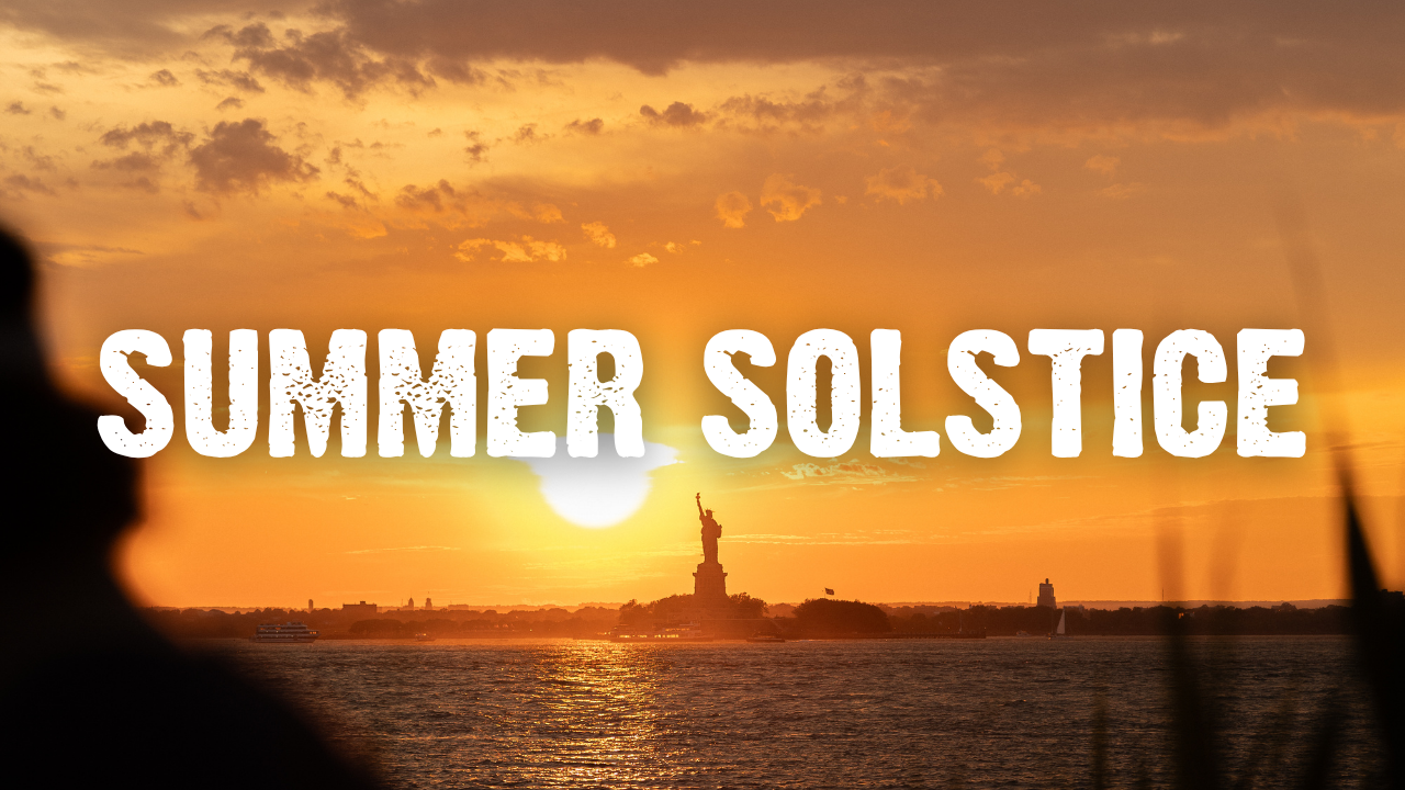 Summer Solstice with the sunset behind the Statue of Liberty