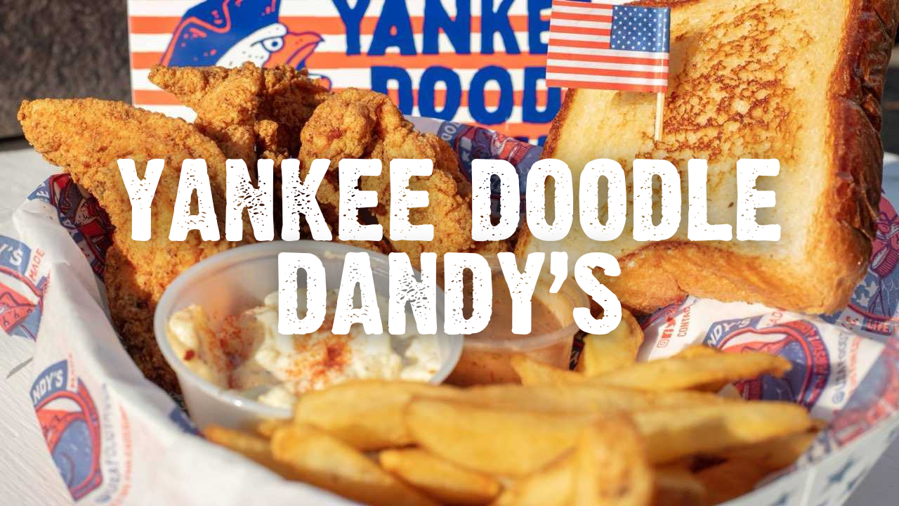 Yankee Doodle Dandy's with a basket of chicken tenders, Texas toast, french fries, and potato salad with Yankee Doodle Dandy signage behind with an eagle wearing a tricorn hat and an American flag