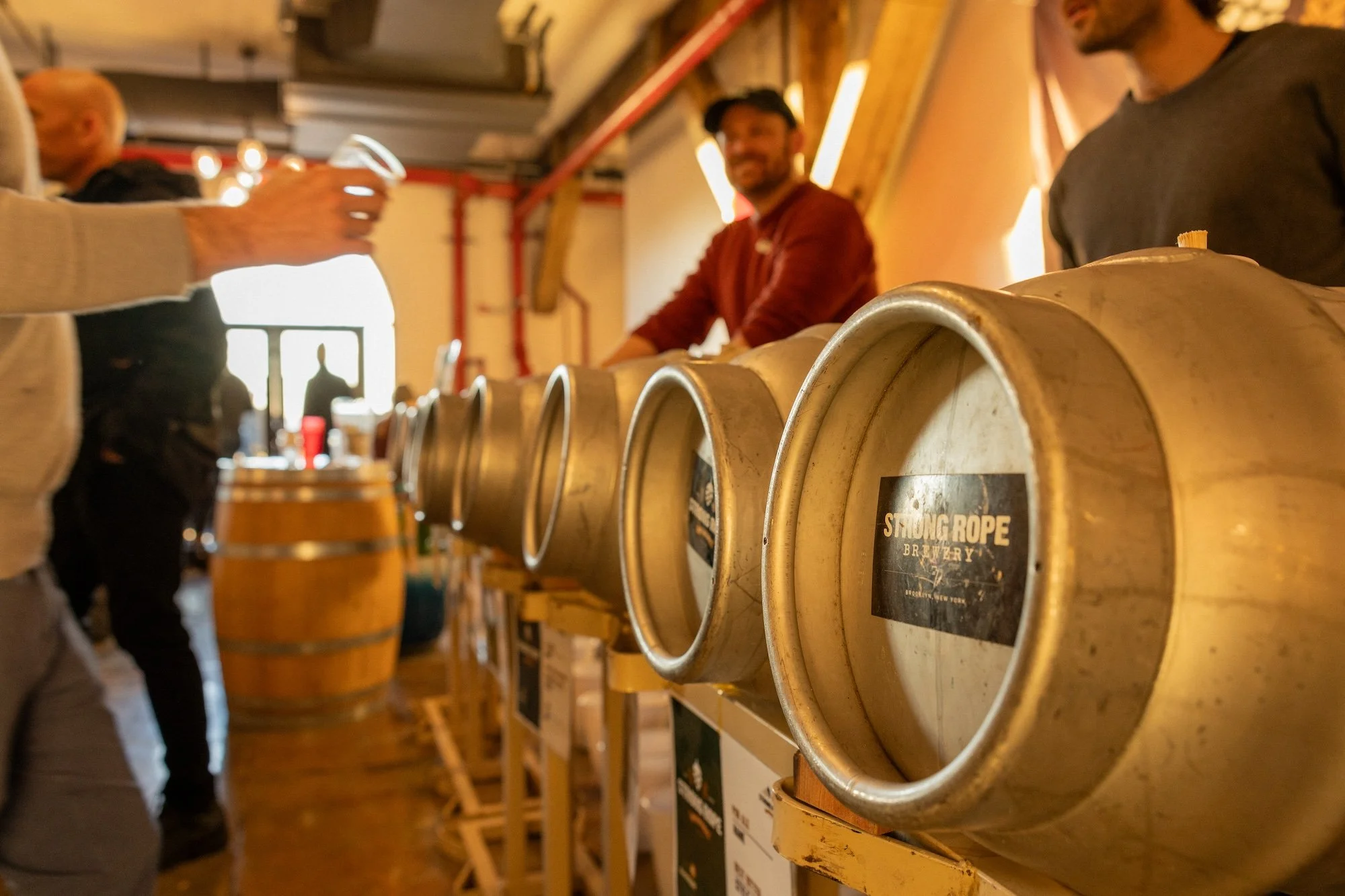 A row of casks in a taproom