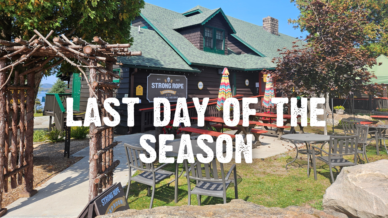 Last Day of the Season with Strong Rope Brewery taproom with chairs outside, trees surrounding it, and a lake and mountain in the background