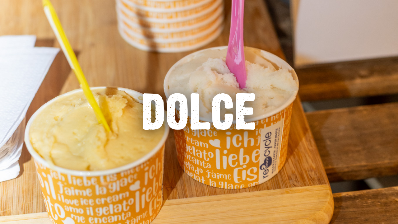 Dolce with sorbetto in cups on a wooden table