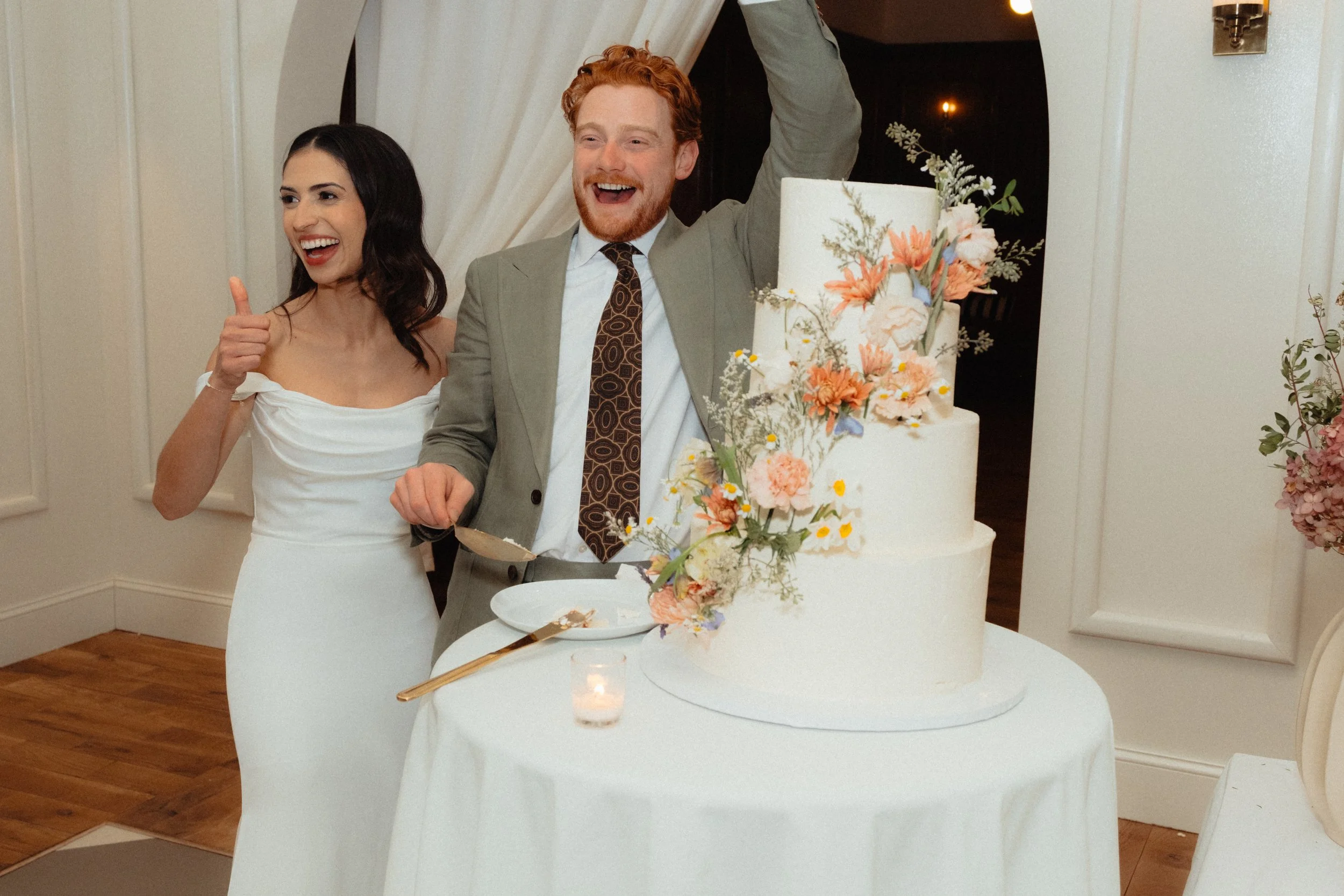 nick and emily wedding cake cutting Hillshore Photography-27.jpg