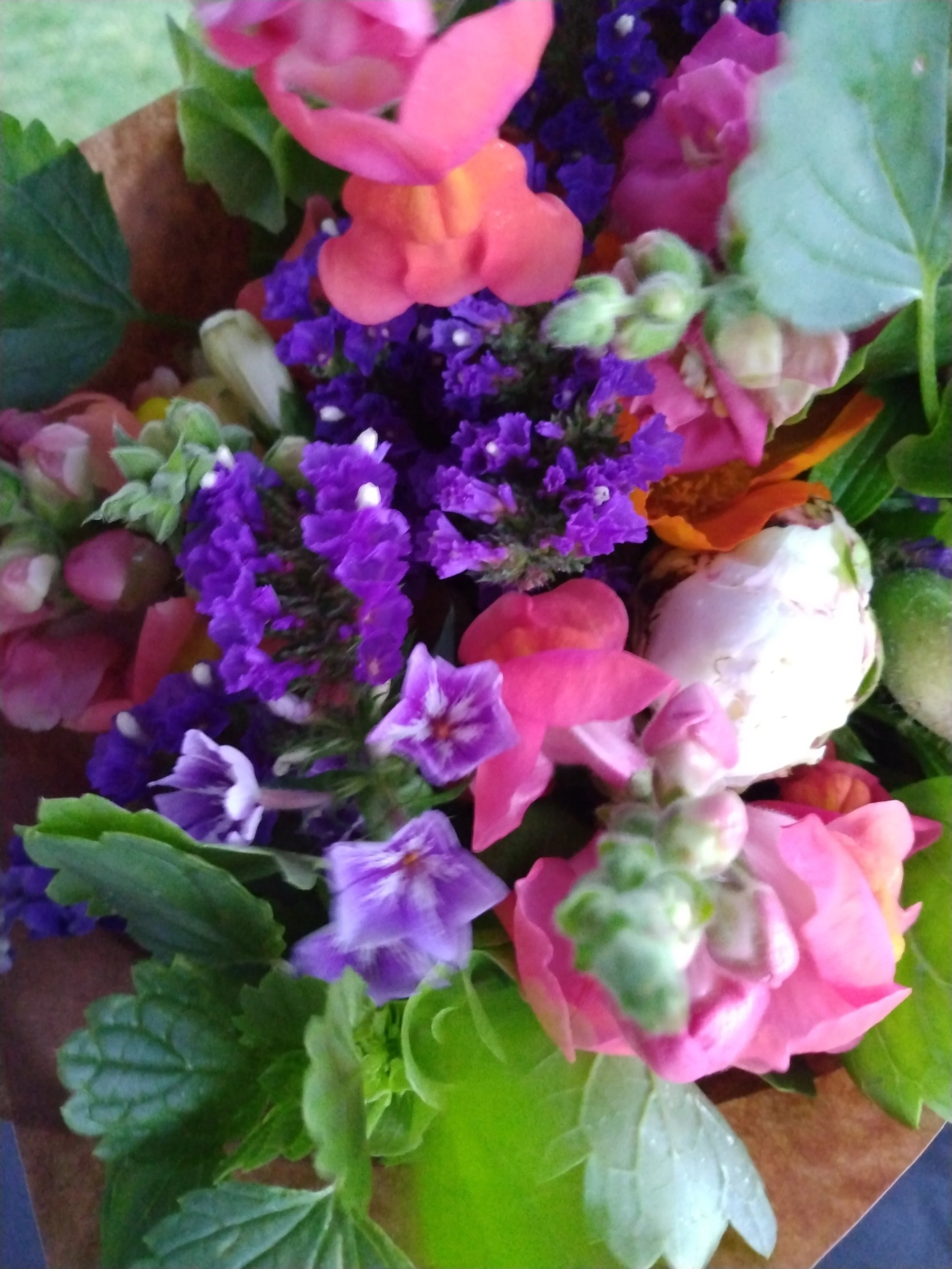 Purple, pink, orange, and white bouquet