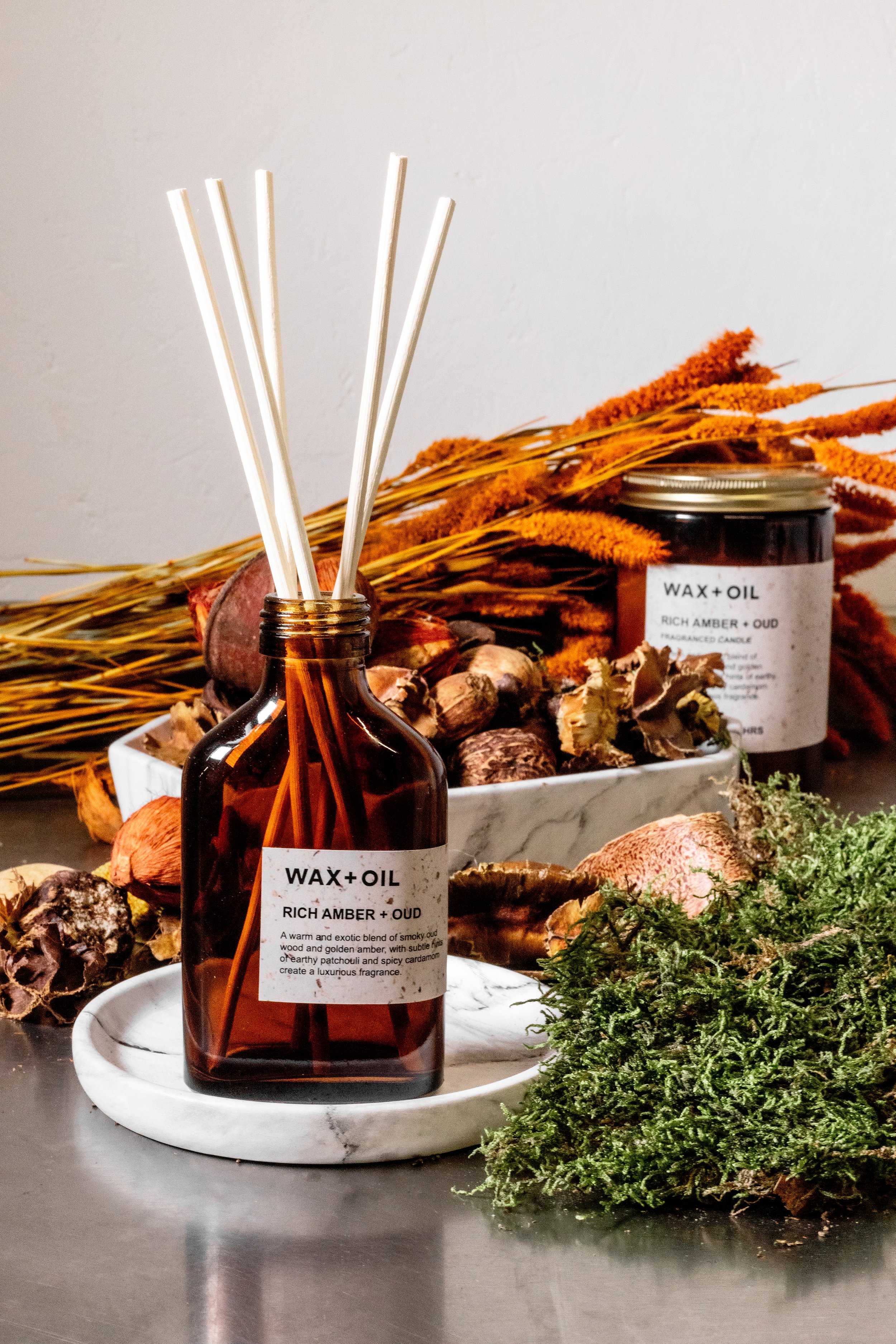 Reed diffuser and candle with dried botanicals
