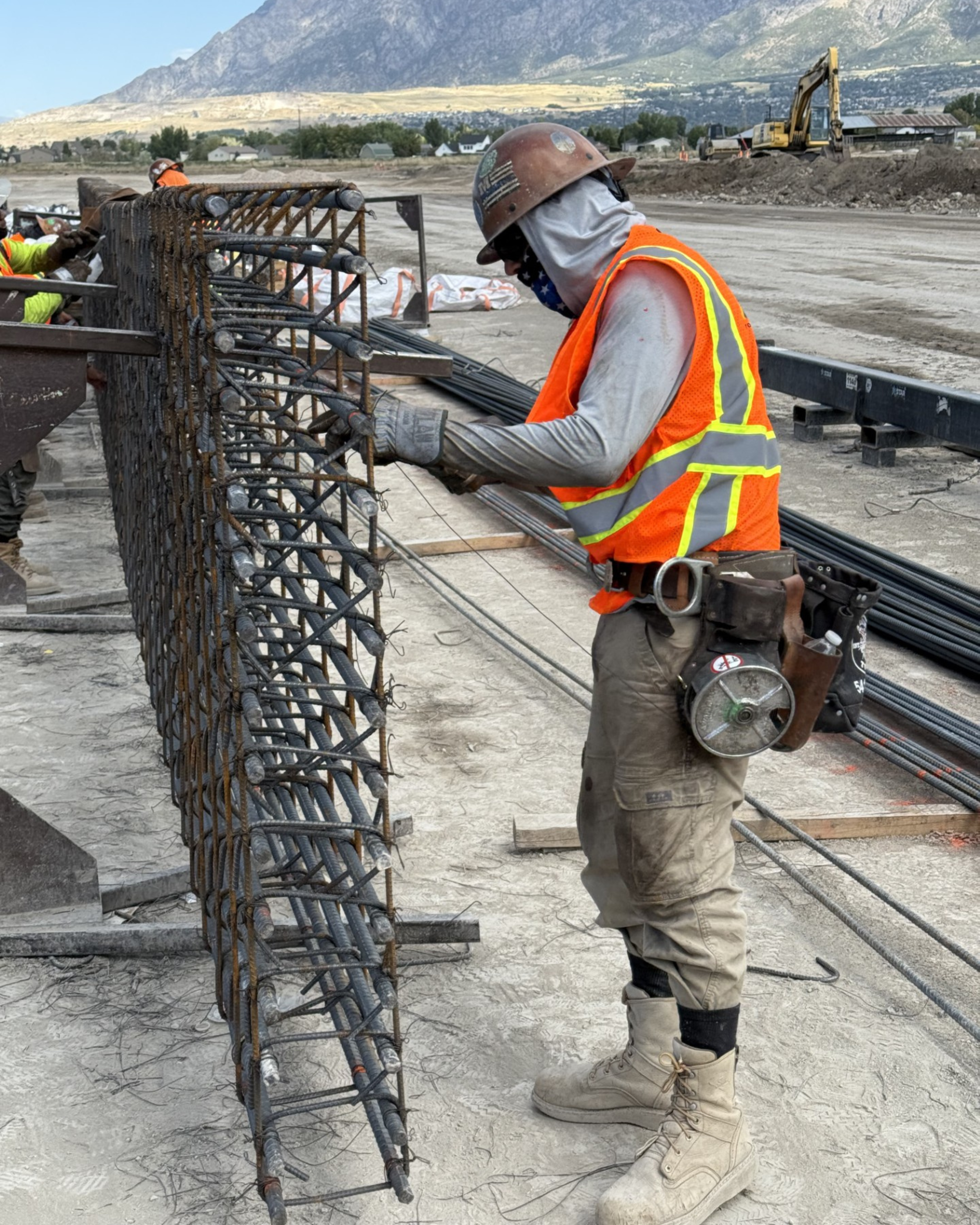 Tom Stuart Construction, Utah's Premier Commercial Contractor employee working with rebar in Utah