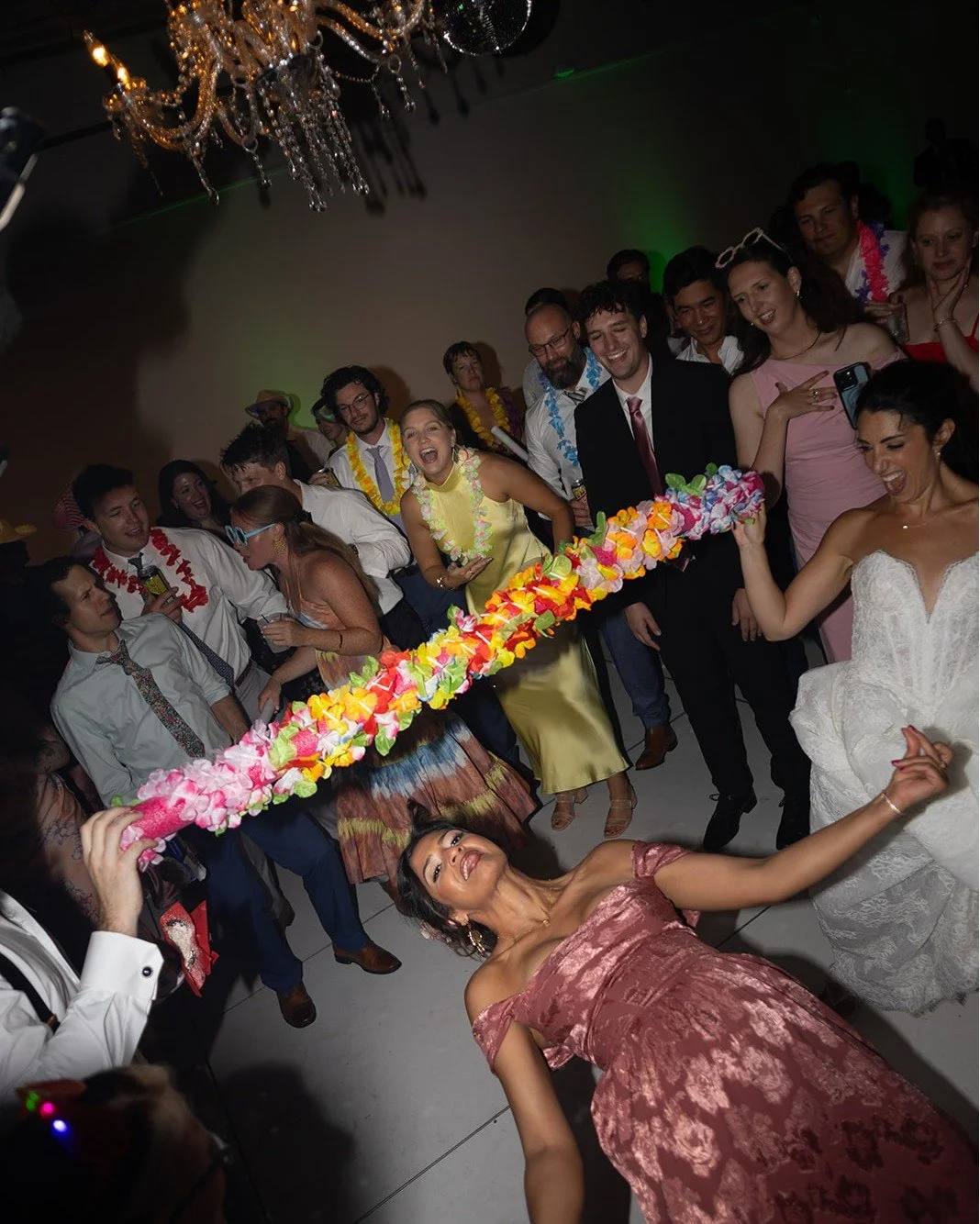 How low can you go?! 😂🪩

Nothing brings out everyone's competitive side quite like a little wedding reception limbo! Safe to say, this dance floor understood the assignment. 🙌

Who else thinks limbo should make a comeback at every wedding?

Photos
