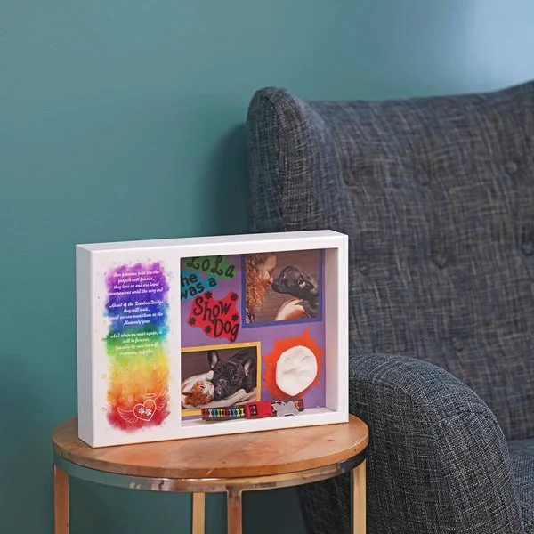 Rainbow Bridge shadow box urn with memento area and comforting design for pets.