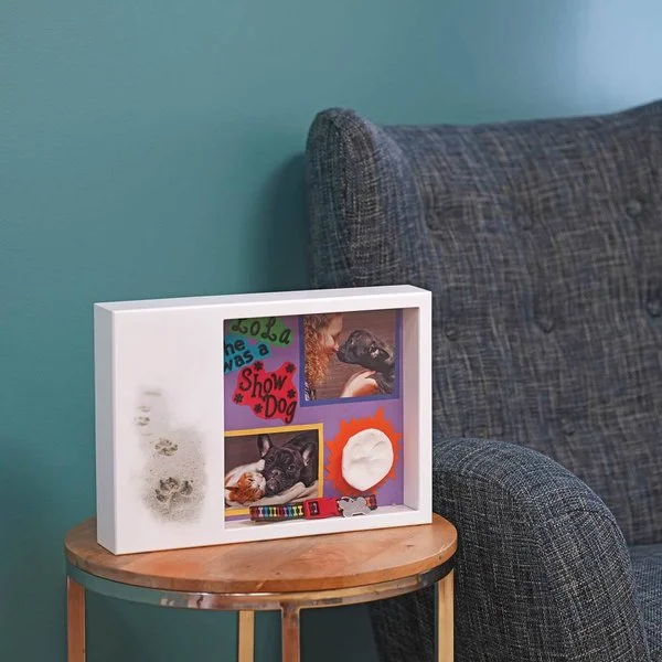 Paws in Sand shadow box urn with memento area and peaceful design for pets.