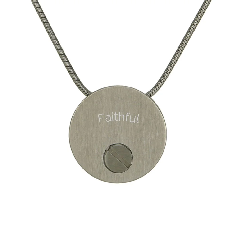 Pewter round pendant with two black paw prints, matching 19-inch chain, and discreet memento compartment.
