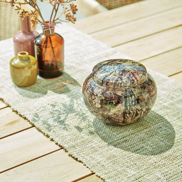 Mossy Oak camo pet urn made from durable aluminum with secure closure, available in three sizes.