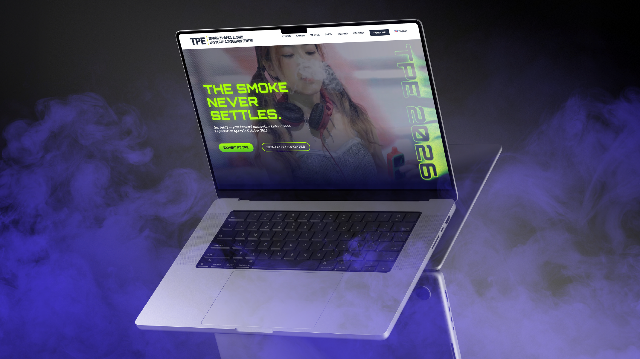 An image of a floating laptop surrounded by smoke featuring the above-the-fold section of the TPE homepage.