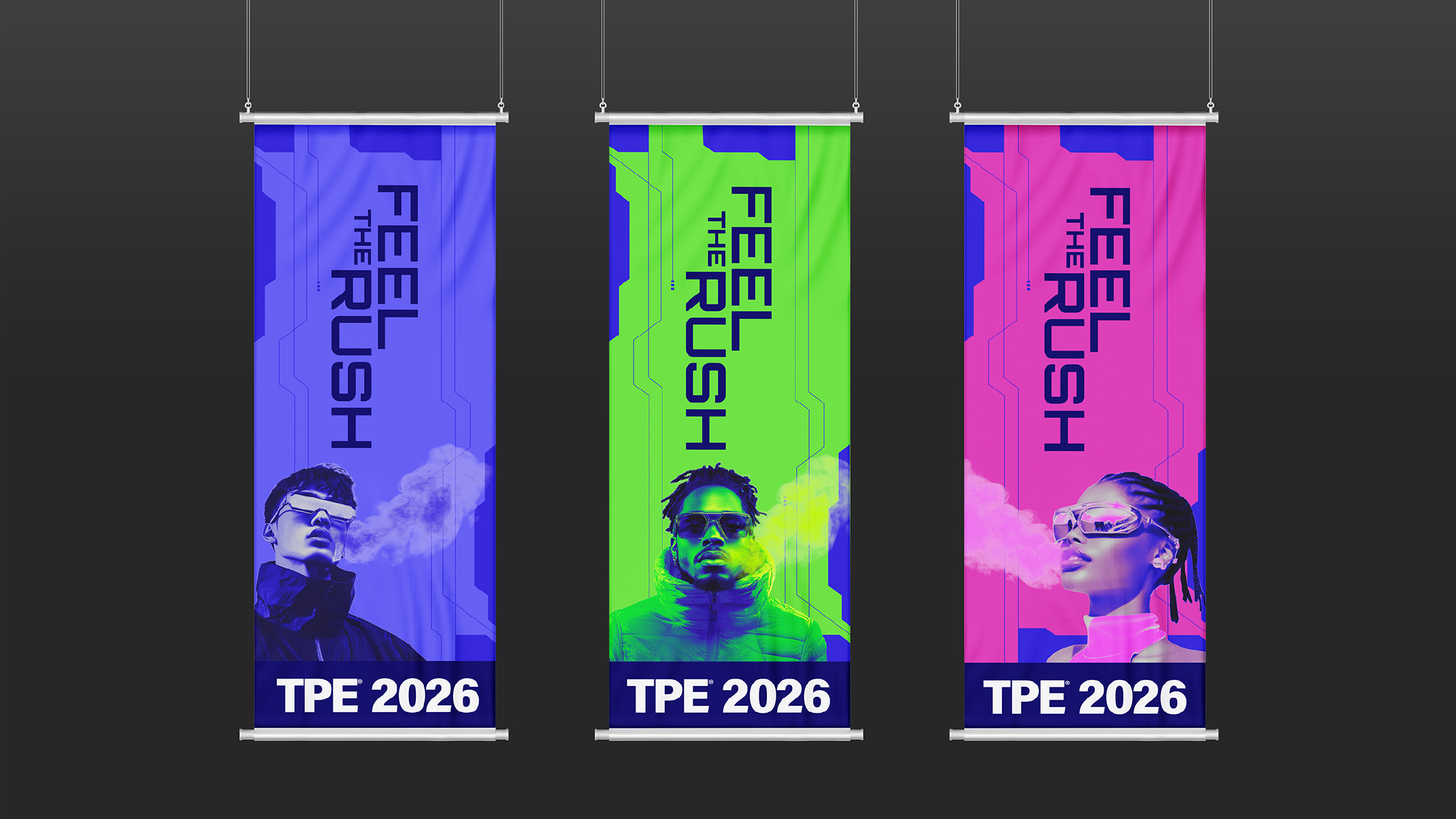 An image of 3 versions of the ceiling banners for the TPE event. Each represented in their own color of Blue, Green, and Pink. Demonstrating the color system of the signage system.