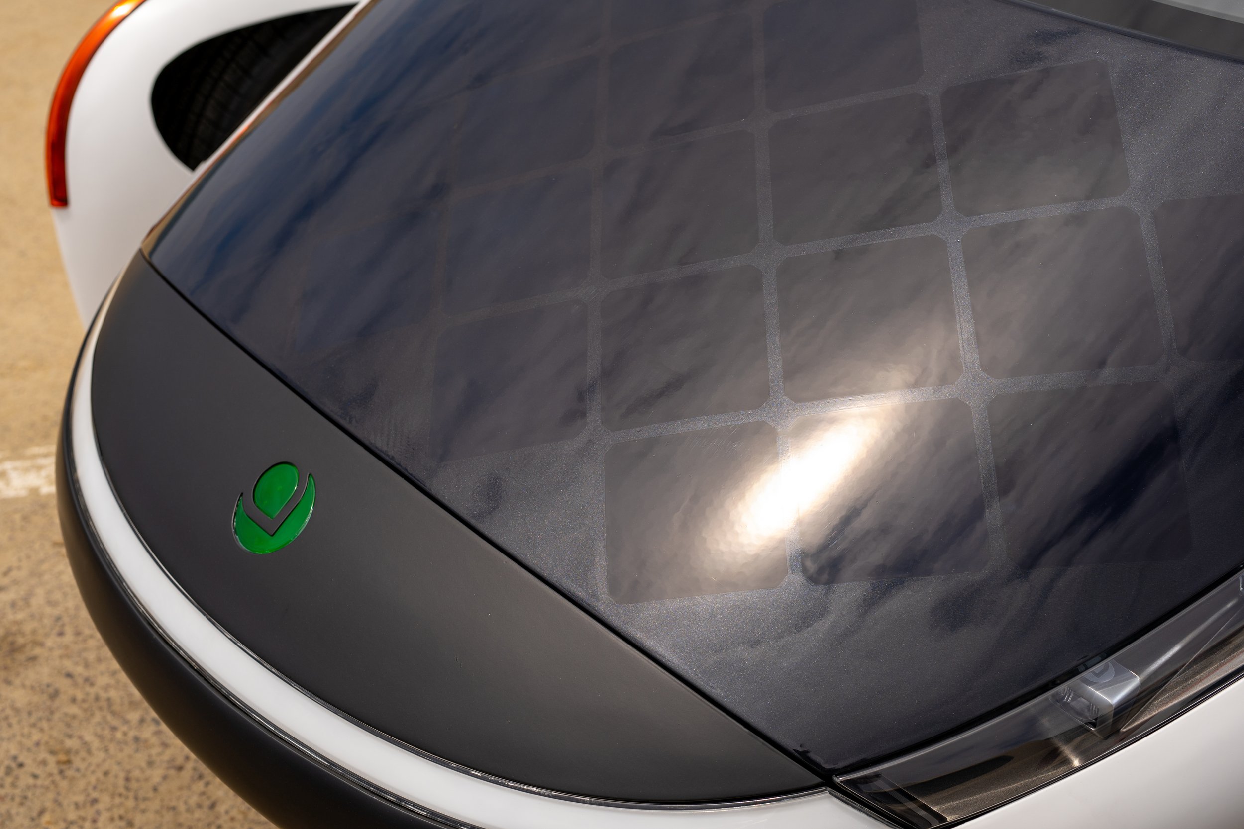Close up feature shot of the front hood solor panel system on the Aptera vehicle