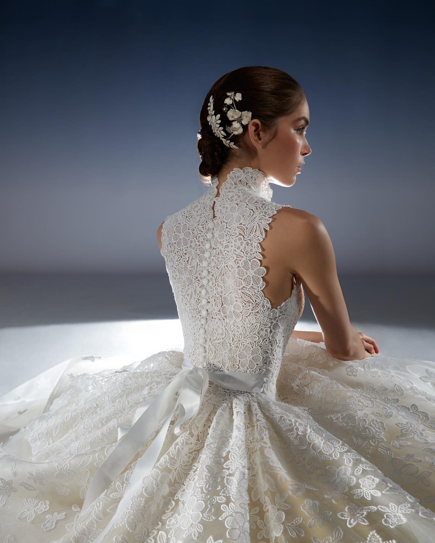 Here for a limited time&hellip;Glass Slipper by @peterlangner has made her way to Gamberdella! Adorned with floral appliqu&eacute; and a chic neckline Glass Slipper is the dress of your dreams.