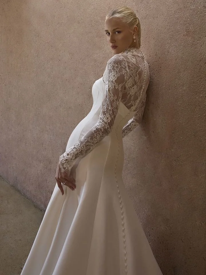 ✨ Brand New BODYSUIT Arrival ✨

Bodysuits by Casablanca have officially landed at Gamberdella and we couldn&rsquo;t be more excited.

This sheer lace piece is nothing short of a bridal masterpiece. From its scalloped turtleneck collar to its intricat