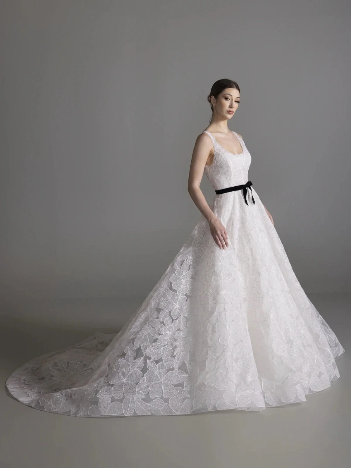 Now at Gamberdella, the return of Lazaro!

Brooklyn debuts: ivory tulle, intricately floral-embroidered, composed into a sculptural ball gown with a defined natural waist and a sweeping circular skirt that resolves in a chapel train. A restrained sco