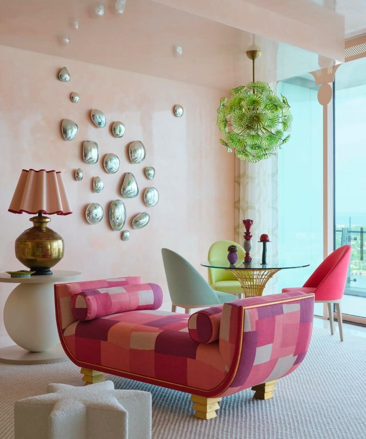 A chic living room showcasing the perfect shade of Palm Beach peach designed by @cecebowman and shot by @brantleyphoto. Styled by @francesfinds