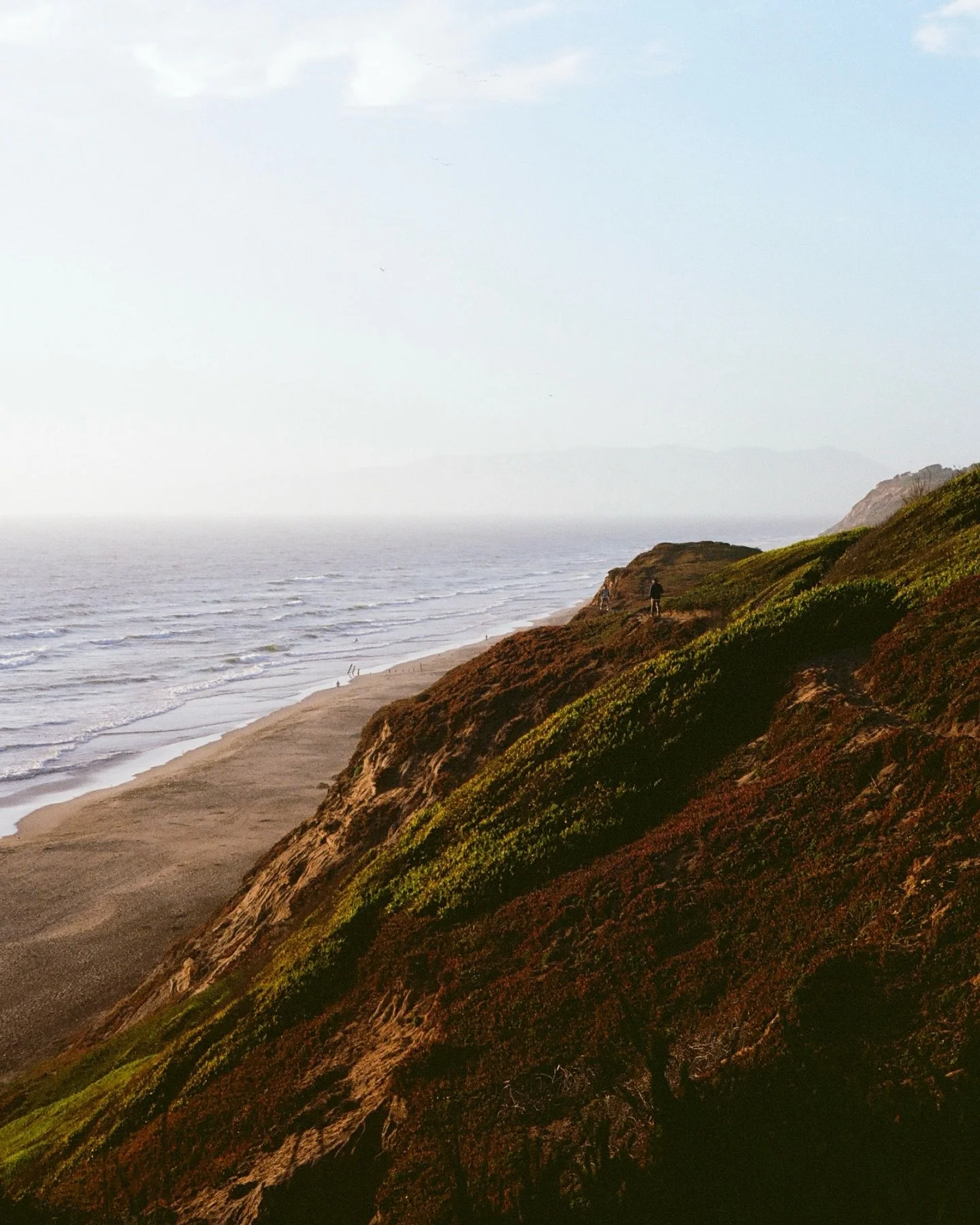 california sunset blues on film // 2025

There&rsquo;s a pause here,
in the in-between,
where endings and beginnings
blur at the edges.
It asks for nothing
but presence.

So I watch the last light drift,
feel the cool settle in,
and let myself belong