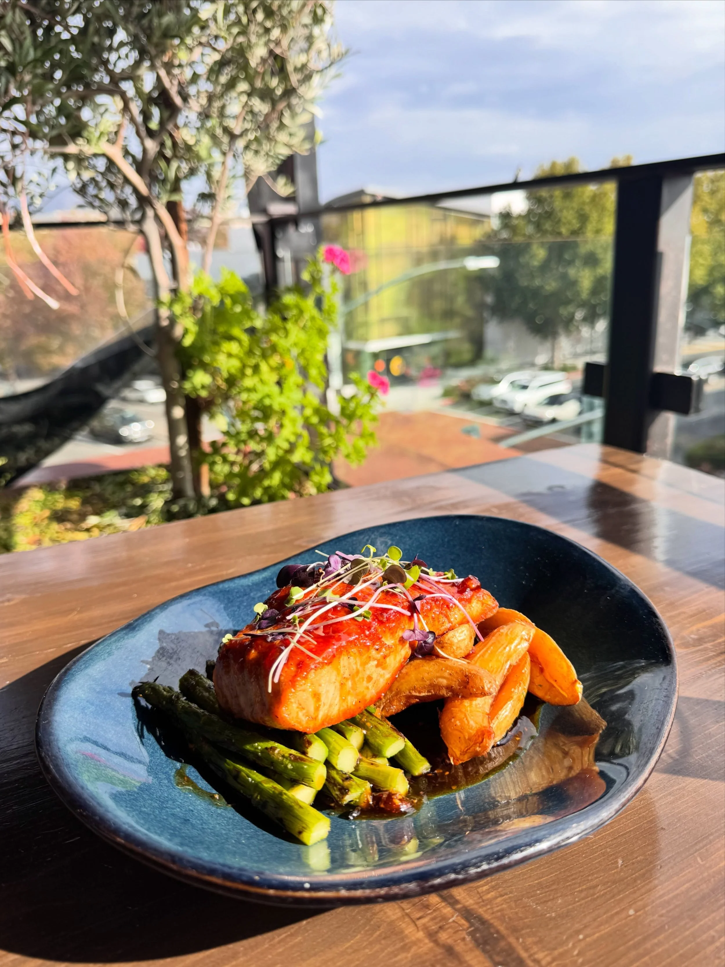 Rain or shine, it&rsquo;s always better at Rooftop 🌧️☀️

Settle in and enjoy our Salmon, served with fingerling potatoes, asparagus, and a honey-ginger soy glaze. The perfect dish to enjoy no matter the weather.

Make your reservation and dine with 