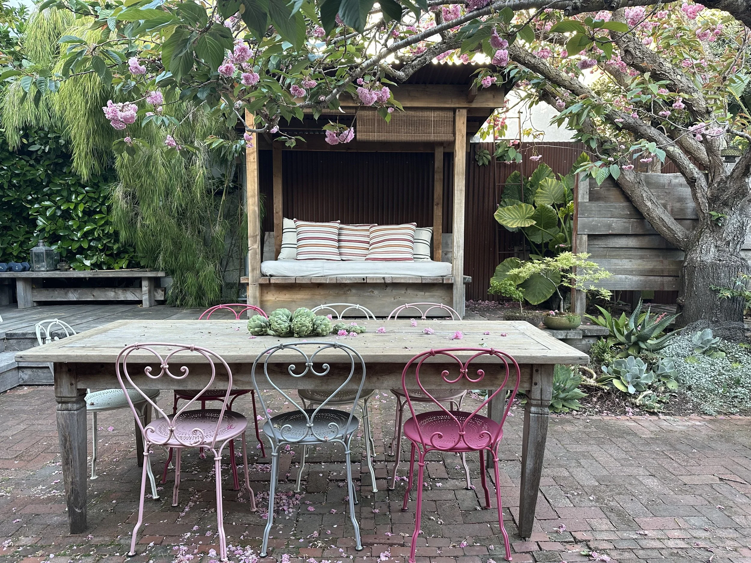 Fermob furniture in Flora Grubb's home garden