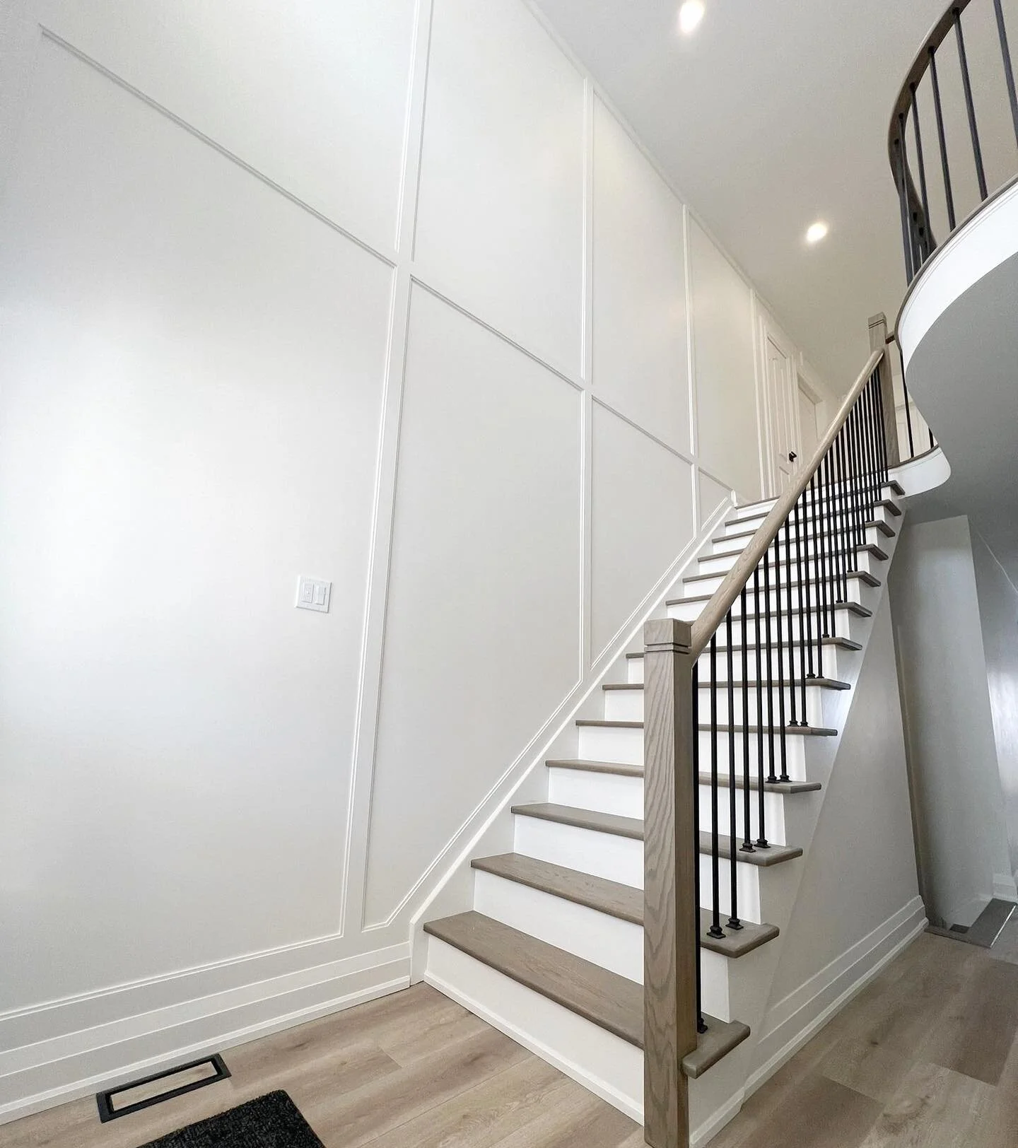 Do you love this foyer design? #staircaserenovation #interiordesign #modernfarmhouse #phamconstruction #trusttheprocess #followthejourney