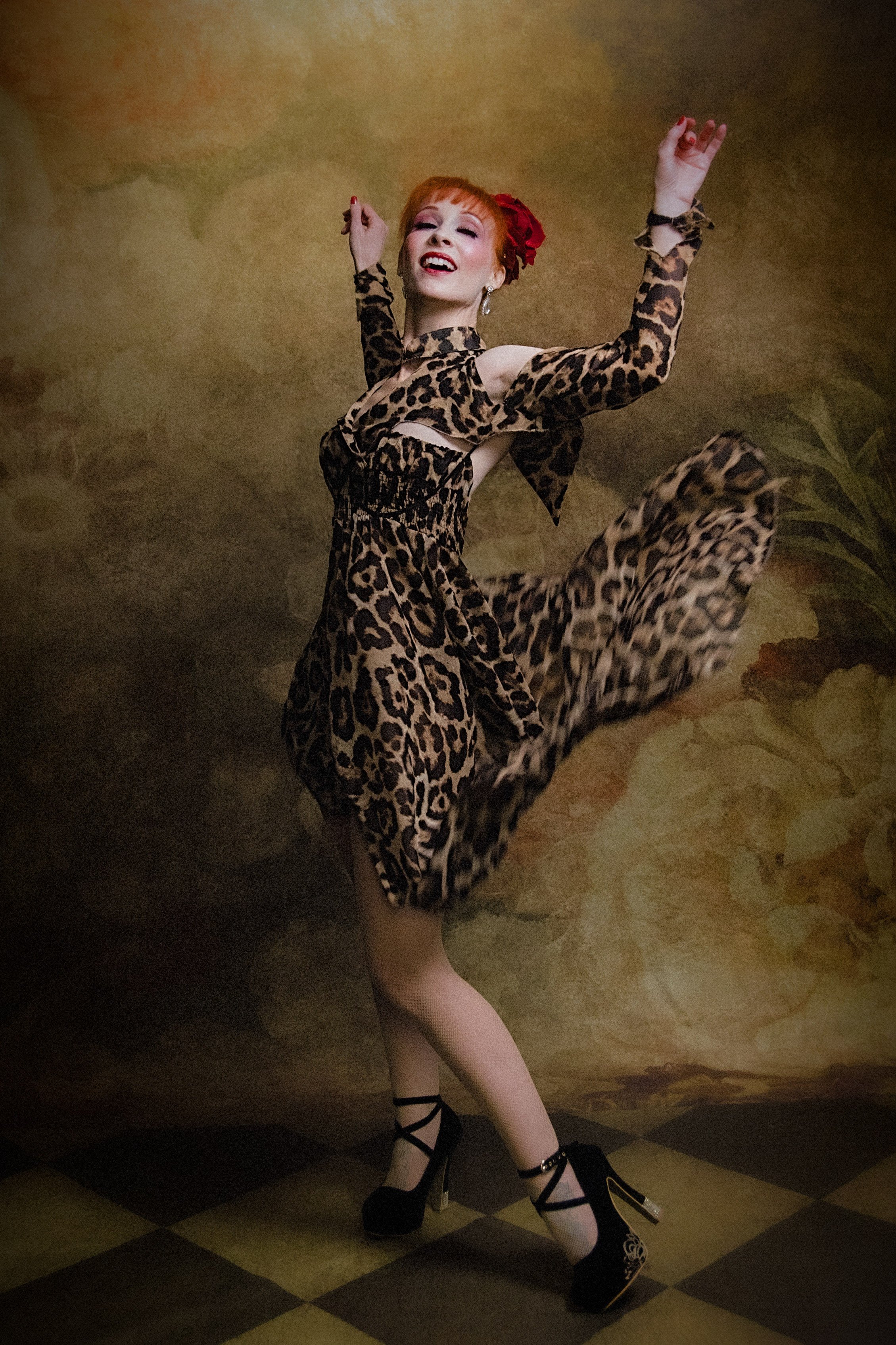 Dress in motion leopard print fun dress Burlesque performer artist photography Grass Valley Studio Portraits