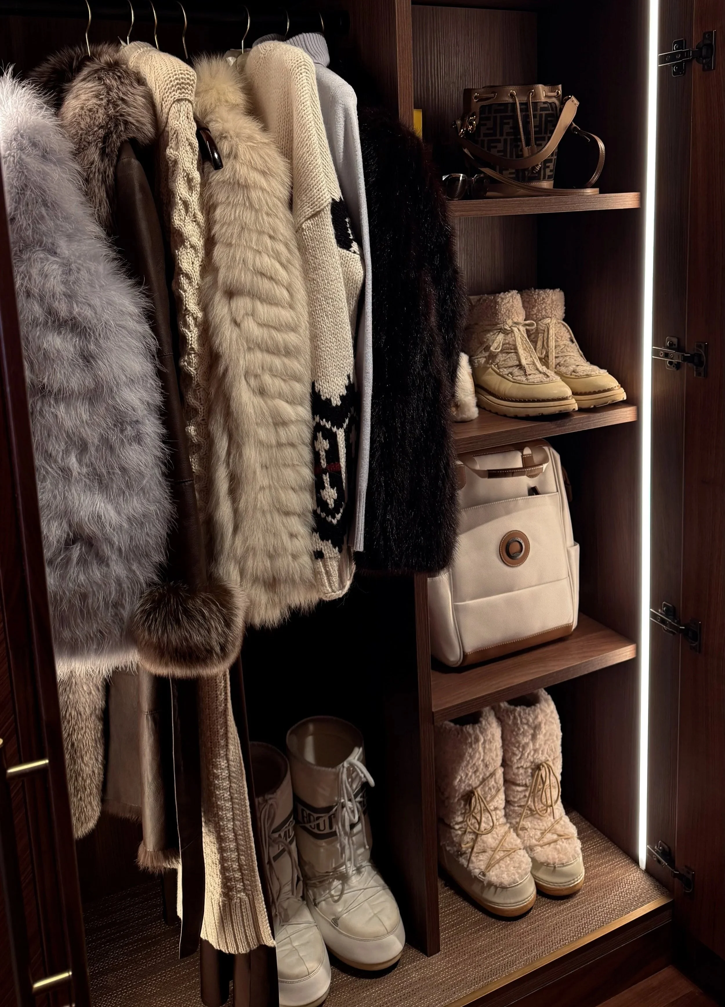 Seasonal closet refresh with fall sweaters and boots ready to swap in for summer clothes