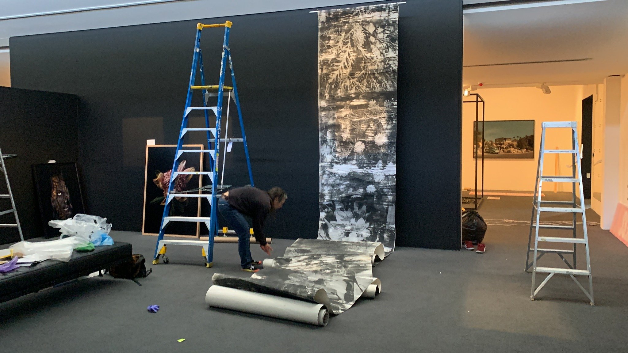 Zo Damage installing "TRUST" (2022) – MAPh Bowness Photography Prize 2023 shortlist – for the MAPh Bowness Prize 2023 finalist group exhibition. Photo courtesy MAPh, 2023 