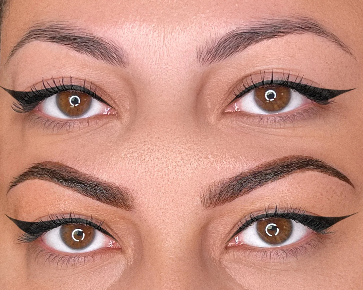 Close-up of a person's face showing eyes and eyebrows with makeup, including eyeliner and mascara, and reflection of a ring light in the eyes.