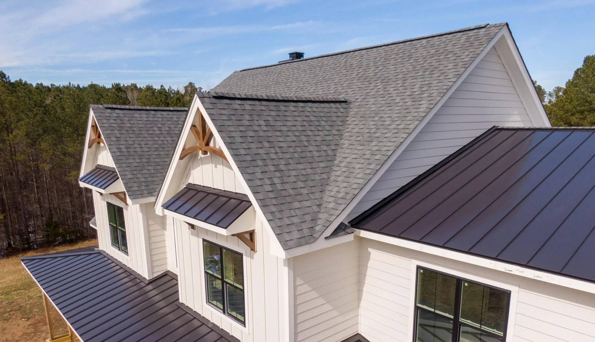Asphalt vs. Metal: Which Roof Makes Sense for Your Maine Home?