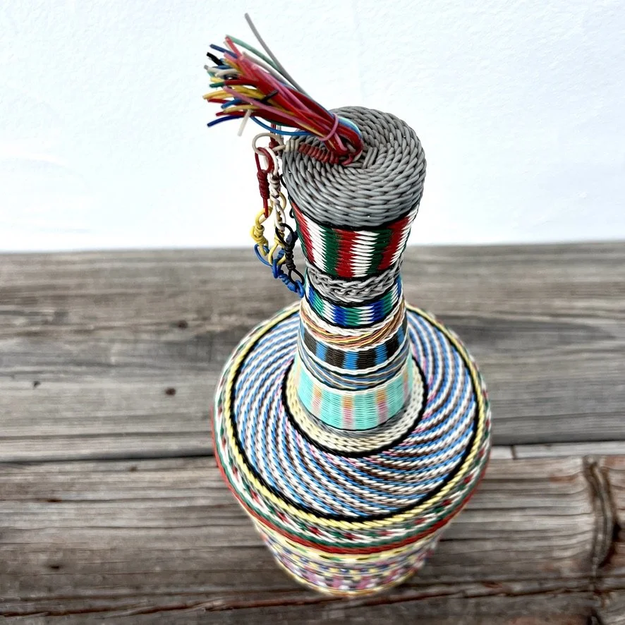 Wire-wrapped miner's bottle from above