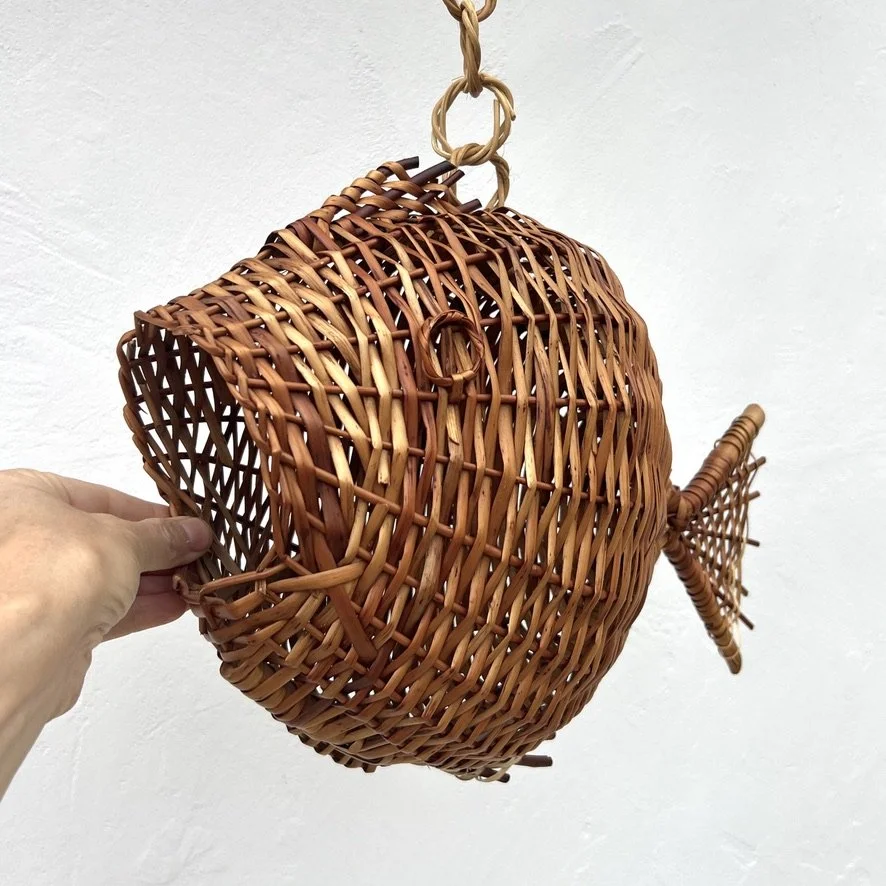 Vintage handwoven rattan fish pendant side view