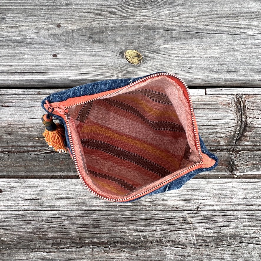 Indigo cloth pouch with orange patches lining