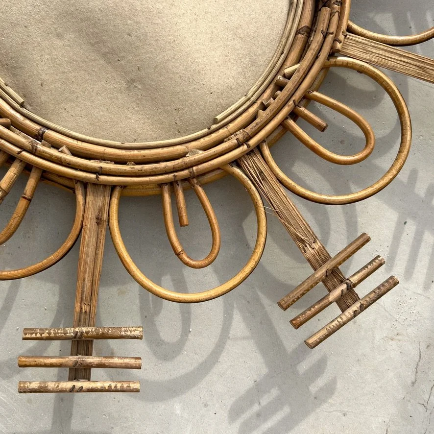 Vintage rattan sun mirror closeup back