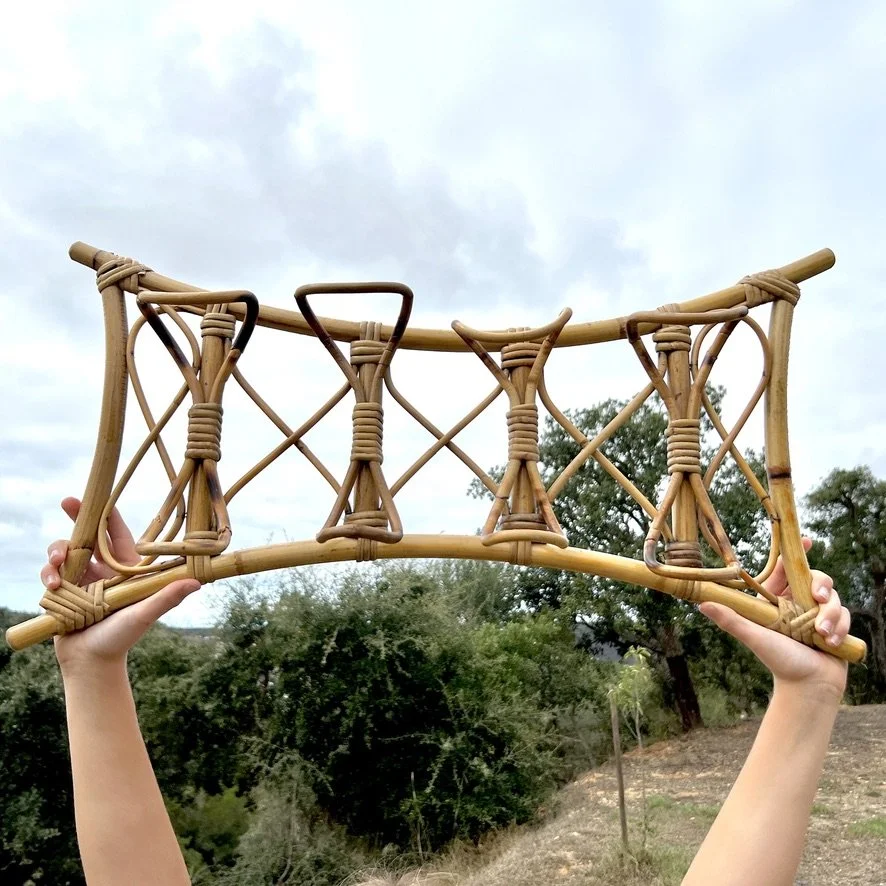 Vintage rattan coat rack with nature background
