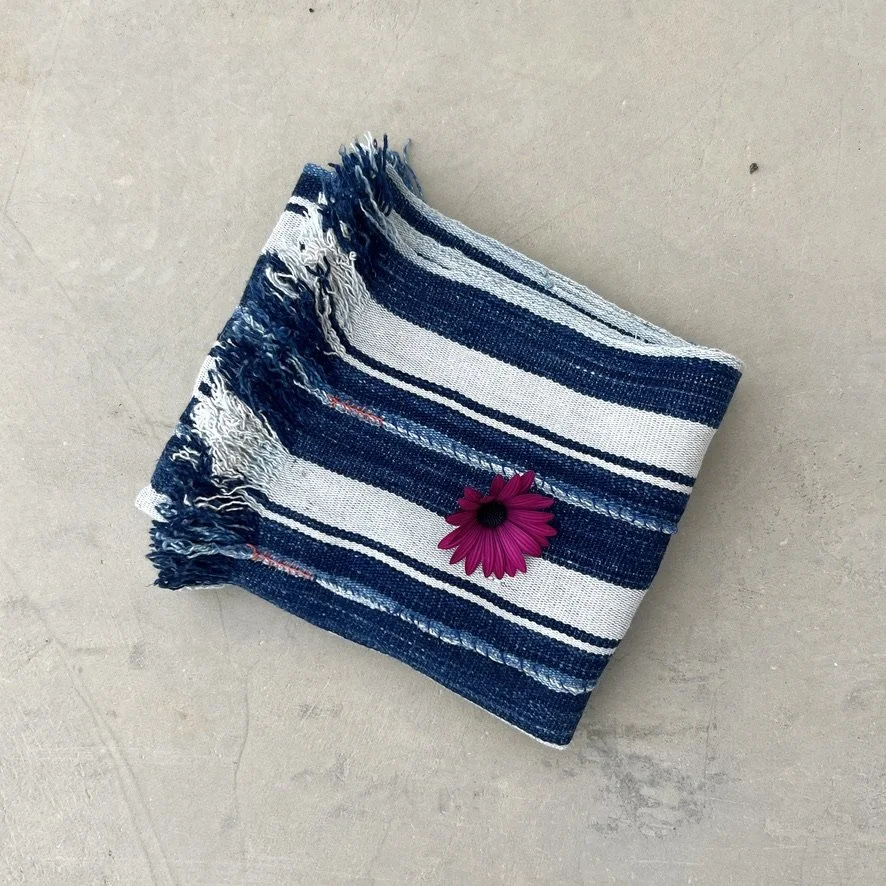Striped Indigo Scarf with embroidered detail folded