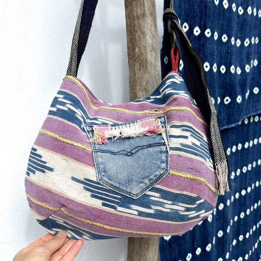 Reversible cross-body bag ethnic textiles backside