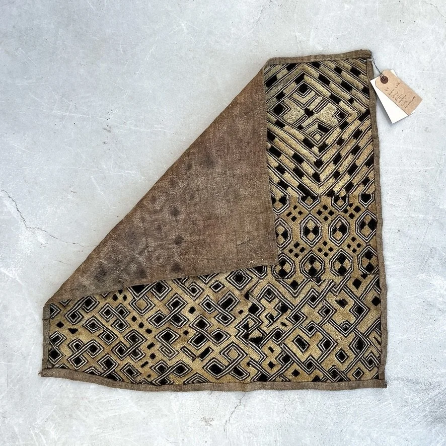 Kuba cloth small pattern corner folded over