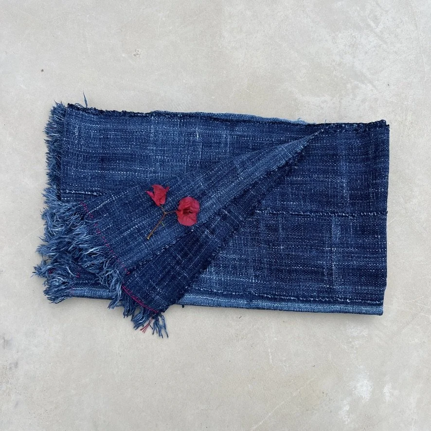 vintage indigo cloth Mali with hand-stitched detail folded