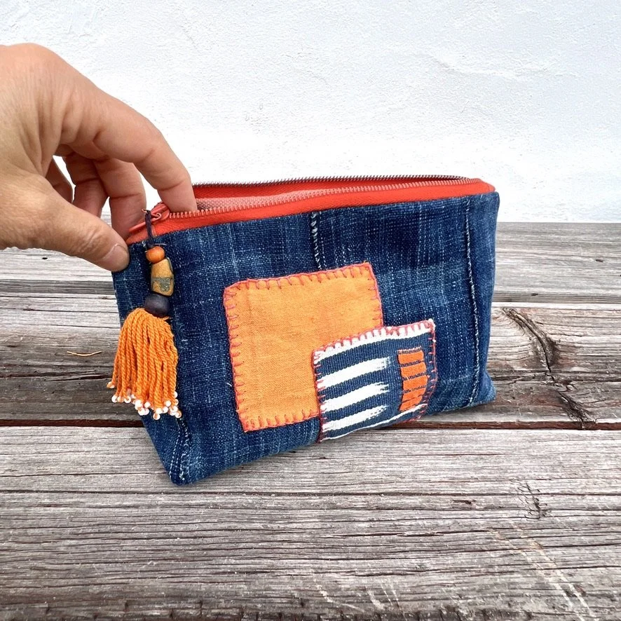 Indigo cloth pouch with orange patches side 2
