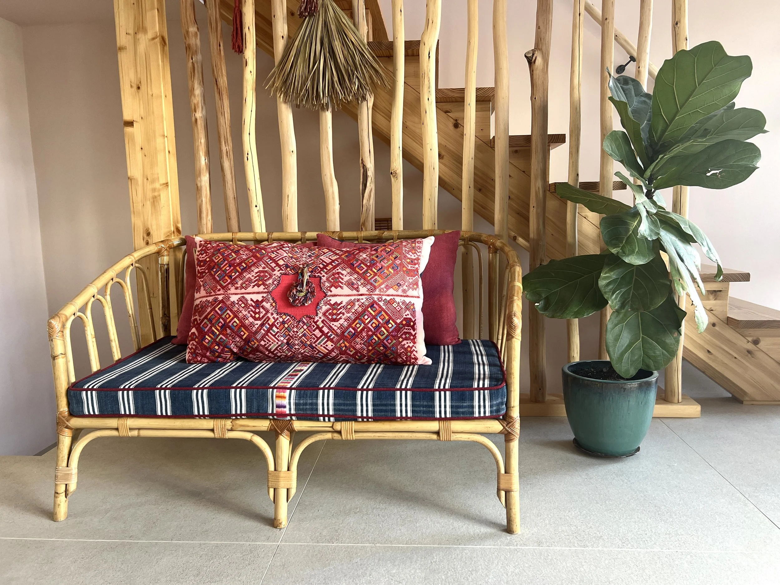 Nahualá huipil cushion cover with hemp backside on sofa 1