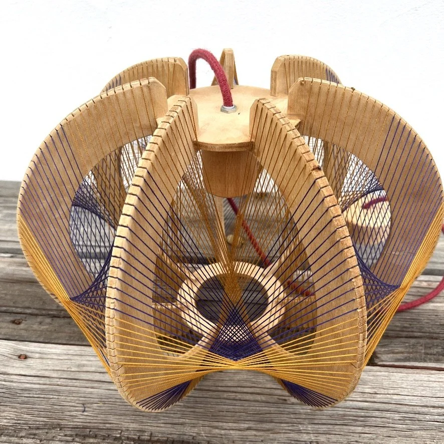 plywood string pendant lamp closeup 1