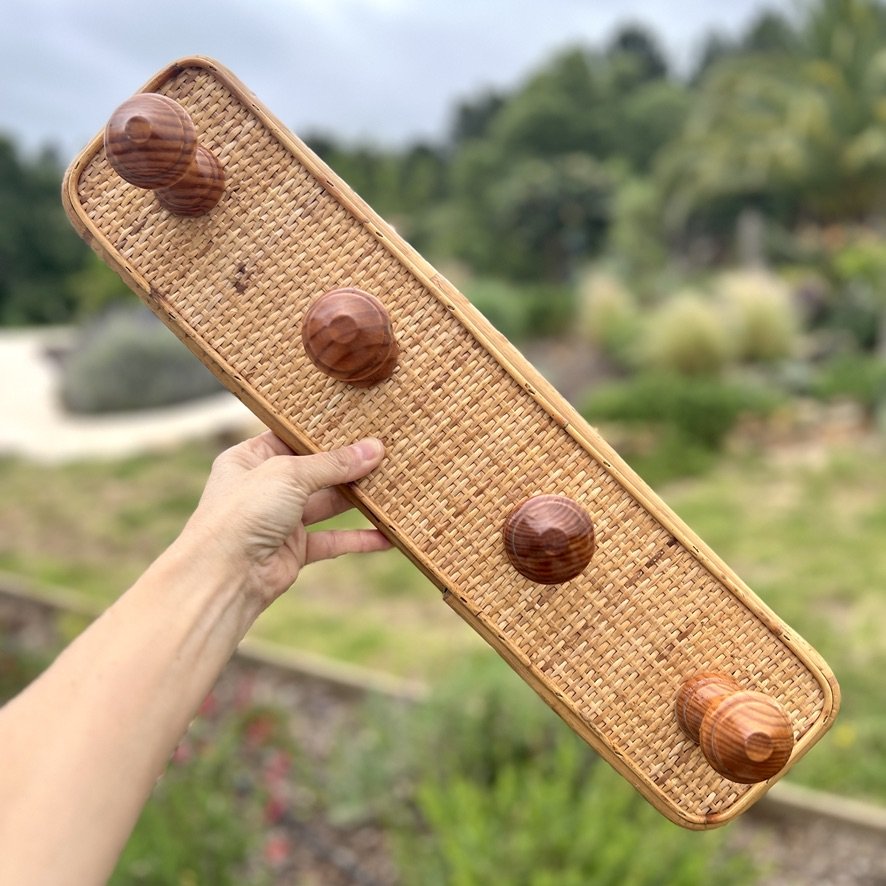 Wood and rattan vintage coat rack with hand