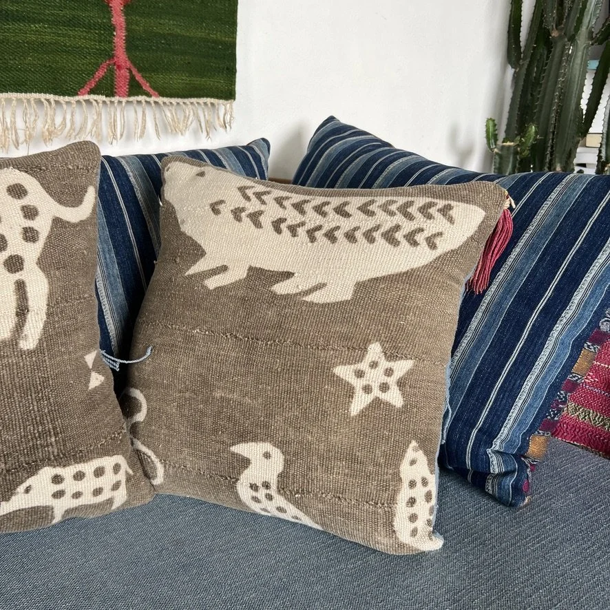 Animal mud cloth cushion on sofa