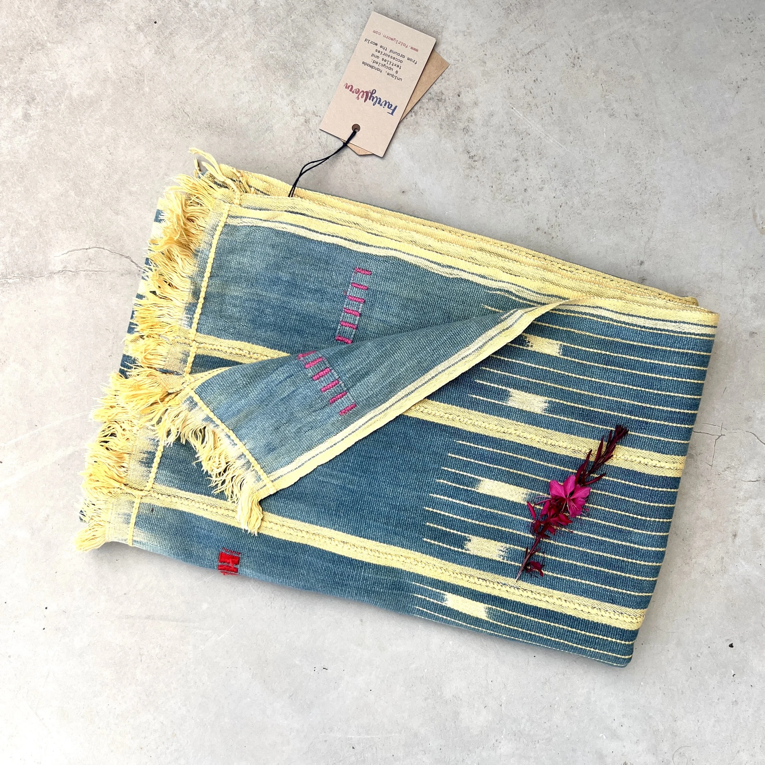 Baoulé blanket petrol yellow folded
