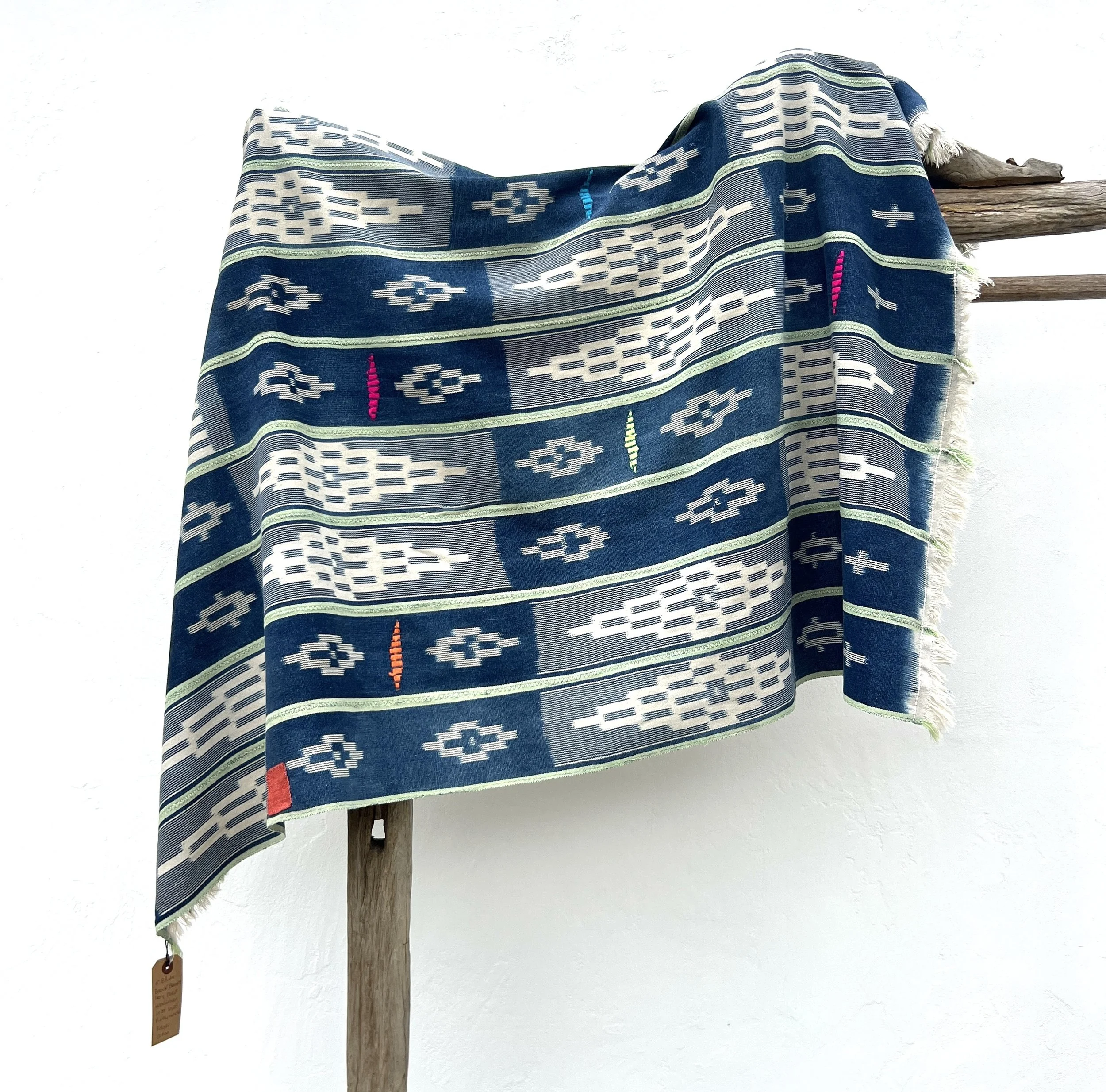 Baoulé blanket green stripes visibly mended main