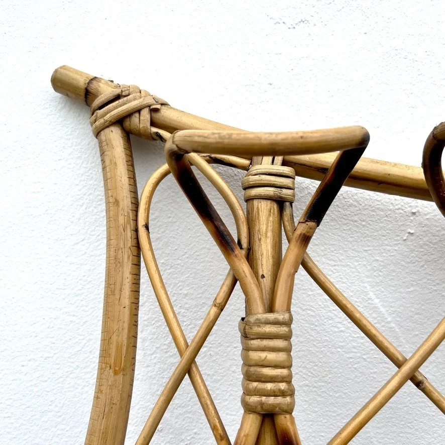 Vintage rattan coat rack closeup