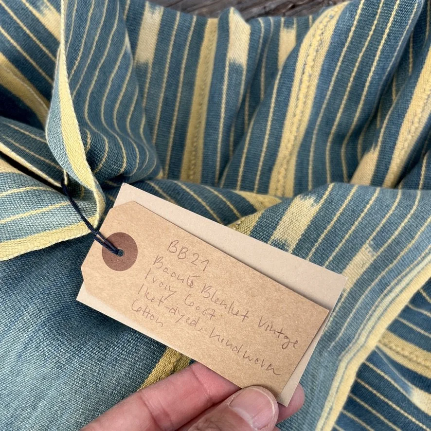 Baoulé blanket petrol yellow closeup tag